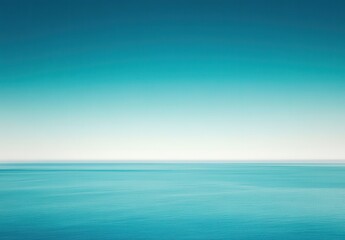 Obraz premium Tranquil Blue Ocean Horizon with Serene Sky and Gentle Waves in Soft Pastel Tones