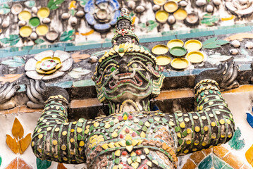 Fototapeta premium Wat Arun decor elements ornament close up. Best known of Thailand's landmarks in Bangkok