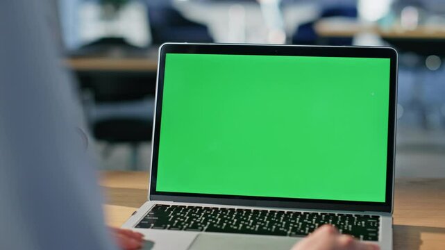 Freelancer working green screen laptop sitting office coworking space closeup. 