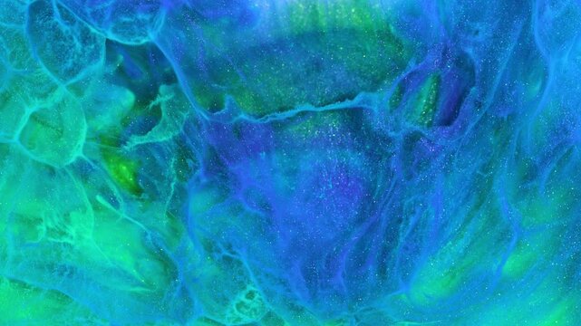 Smooth flowing gradients of green and blue tones enhanced by shimmering glitter particles. Perfect for cosmic themes, digital displays, or creative branding.