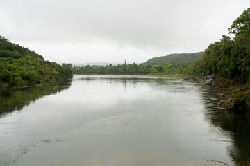 The Grey River on a Cloudy Day – Calm Water Landscape