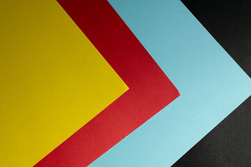 重なるカラフルな画用紙の背景