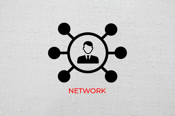 Network text and logo concept with white puzzle 