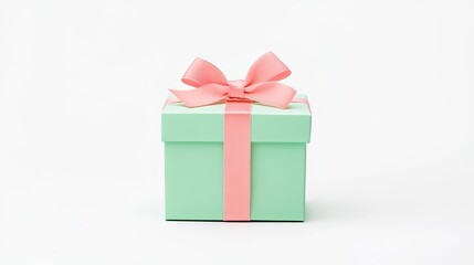 Obraz premium A beautifully wrapped mint green gift box with a pink ribbon on a clean white background