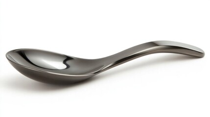 Modern black spoon on white background.  Possible use  Product photography, tableware catalog