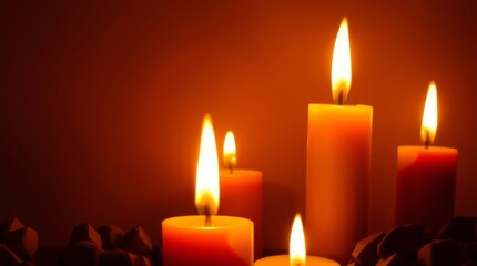 Warm Candlelight with Glowing Flames Creating a Cozy and Romantic Atmosphere

