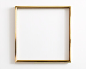 golden frame mockup on a white wall with copy space for your design