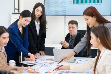  Group of business people working together in a modern office.