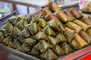 A pile of fresh rice dumplings close up, traditional Chinese festival food