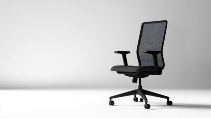 Modern black office chair in minimalist studio setting