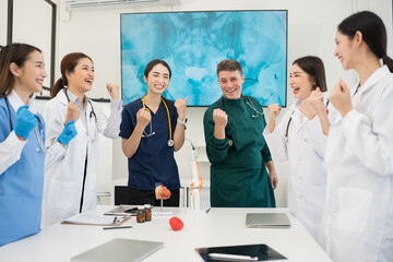 Fototapeta premium Male and female doctors are having a meeting in a hospital room.