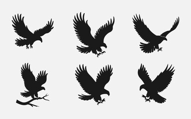 Obraz premium Flying Eagle Silhouette Set – Vector Illustration for Logos & Designs