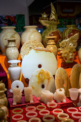 Close-up of traditional Chinese jade ornaments sold in the store