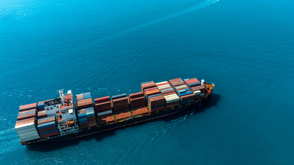 Fototapeta premium Title Aerial view of the freight shipping transport system cargo ship container. international transportation Export-import business, logistics, transportation industry concepts 