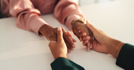 Holding hands, trust and couple in home for love, compassion and connection on table. Relationship, dating and closeup of man and woman with affection or gesture for commitment, care and support