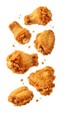 Delicious crispy fried chicken pieces floating in the air against black background