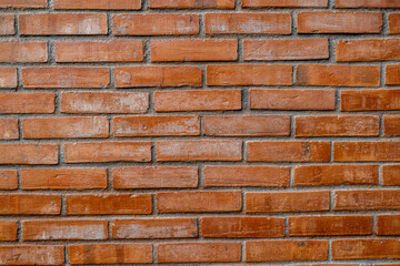 Red Brick Wall Background Showcasing Rustic Texture with Symmetrical Patterns and Natural Imperfections in a Timeless Architectural Style.