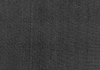 Black craft paper texture background, minimal aesthetic design. Black textured Old vintage page or grunge vignette of newspaper design with copy space for wallpaper or backdrop. Minimal black crumpled