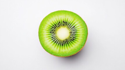 Freshly sliced kiwi fruit showcasing vibrant green flesh and intricate seed patterns against a plain background