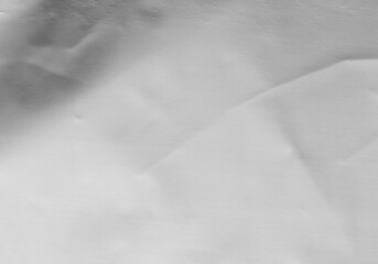 White recycled craft paper texture as background. Grey paper texture, Old vintage page or grunge vignette of old newspaper. Pattern rough art creased grunge letter. Hardboard with copy space for text.