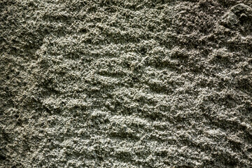 Textured Stone Wall Background with Natural Rough Surface and Unique Patterns, Highlighting Organic Beauty and Structural Details.