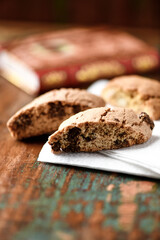 Cantuccini (Italian cookies) on dark wooden background. Close up	