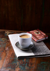 Cup of coffee on wooden background. Soft focus. Copy space.	