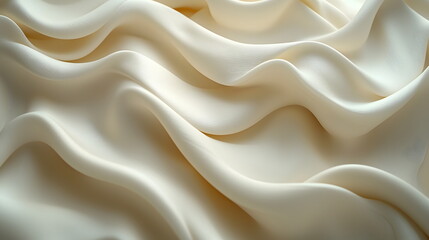 Obraz premium Soft white fabric draped elegantly, creating smooth waves and gentle folds illuminated by soft light.