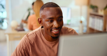 Thinking, creative business and happy man on computer in startup for research, inspiration or...
