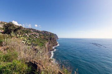 Cliff coast on the island close the the villiage of Ribeira Brave on the island of Madeira (Portugal)