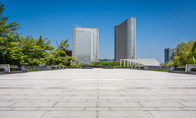 Serene Urban Park with Modern Architecture and Lush Greenery
