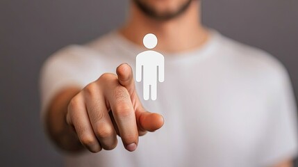 A person points towards a stylized figure, representing interaction or connection in a digital context.