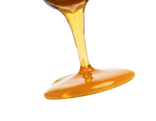 honey dripping from a wooden spoon