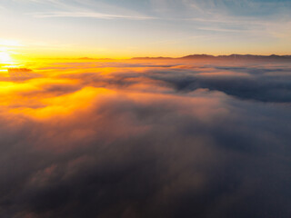 Misty morning in Liptov region with High Tatras mountains around. Liptovsky Mikulas landspace, slovakia.