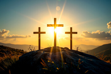 Good Friday and Easter:Jesus Christ, there are three crosses on the rock, with dramatic sunlight shining in the background.
