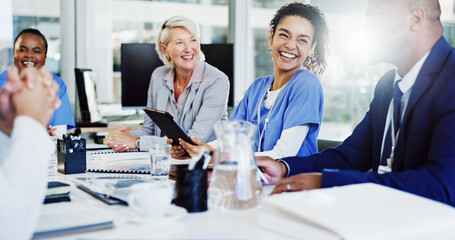 Boardroom, healthcare and laughing with hospital manager speaking to staff for medical planning....