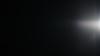 Real optic lens flare over black background for overlay or background