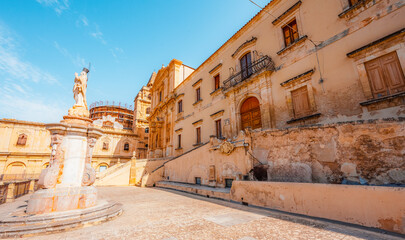 Noto, with the Basilica Minore di San Nicolo and Palazzo Ducezio, Sicily, Italy.