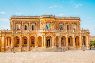 Obraz premium view in Noto, with the Basilica Minore di San Nicolo and Palazzo Ducezio, Sicily, Italy. Palazzo Ducezio .
