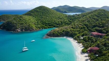 Fototapeta premium An aerial view of a tropical island with lush green mountains, white sandy beaches, and crystal-clear blue waters. 