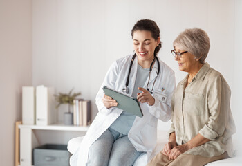 patient with a doctor in medical office