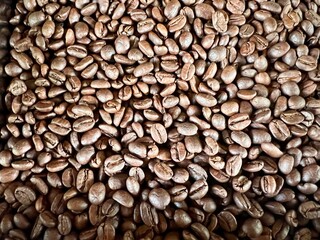 Close up roasted coffee beans background
