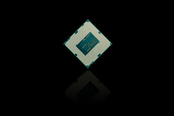 Central Processing Unit (CPU) the bottom side, socket contact for personal computer on black...