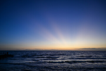 Vivid sunset over water on Port Philip Bay in Melbourne