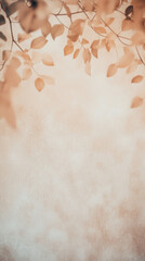 Peachy autumn leaves frame soft light background