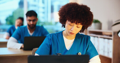 Healthcare, students and doctors with test, laptop or knowledge of diseases, typing and classroom. Education, learning and people with info for medicine, serious and skills for residency in clinic