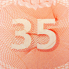 Close-up of intricate orange number 35 design on white background.