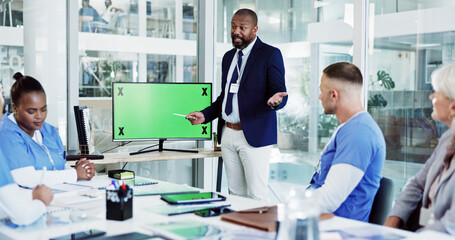 Doctor, coach and presentation with green screen for healthcare training, meeting or discussion at...