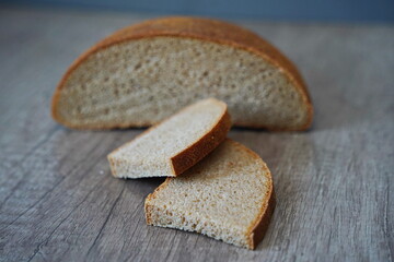 Bread and slices on the table.