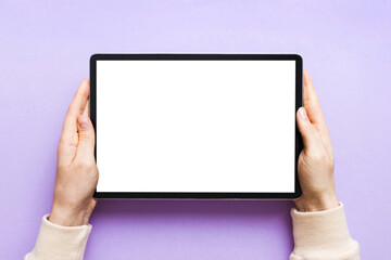 female teen hands using tablet pc with white screen, Mockup image of woman hand holding white tablet pc with blank white screen at home